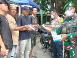Bhabinkamtibmas Desa Ciantra Bagikan Masker kepada Warga, Polisi Ajak Masyarakat Aktif Jaga Keamanan